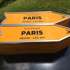 Set of 2 Veuve Clicquot Journey Arrow “PARIS” Champagne Gift Tins – empty, collectible pieces in perfect condition