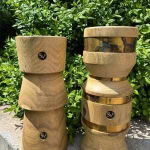 Pair of decorative hat stands – made of solid wood with antique-style brass detailing