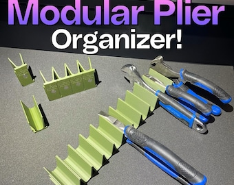 Może przedstawiać: Modułowy organizer do szczypiec w kolorze oliwkowym, z napisem "Magnetic" poniżej. Organizer przeznaczony jest do przechowywania różnych szczypiec i kluczy, z niebiesko-czarnymi uchwytami. Widoczny jest również tekst "Modular Plier Organizer!"