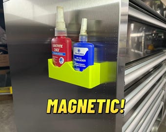 Flessenhouder met magnetische draadborging
