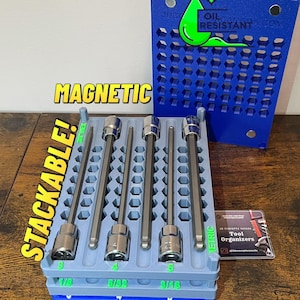 May include: A blue and grey magnetic tool organiser with a stackable design. The organiser holds several metal tools, each labelled with a size in inches. The text "MAGNETIC" and "STACKABLE!" are displayed on the organiser.