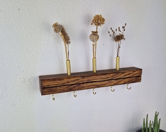 Stylish key holder made of local or exotic solid wood to be combined with dried flowers