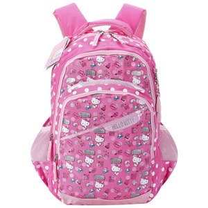 May include: Pink backpack featuring a Hello Kitty design with white polka dots. The backpack has multiple compartments, including side mesh pockets and a front zippered pocket. The words "Hello Kitty" are printed on the front.