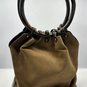 Vintage Bamboo Top Handle Bag, Gucci (Lot 1055 - Holiday Boutique: Luxury  Accessories, Jewelry, & SilverDec 8, 2022, 10:00am)