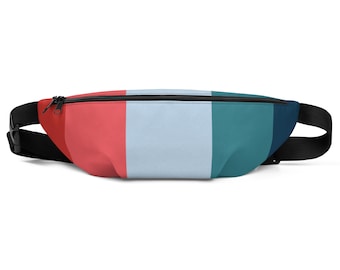 May include: A bum bag featuring a colour-blocked design with vertical stripes in red, light blue, teal, and dark blue. The bag includes a black zip closure across the top and an adjustable black strap with a plastic buckle on each side.