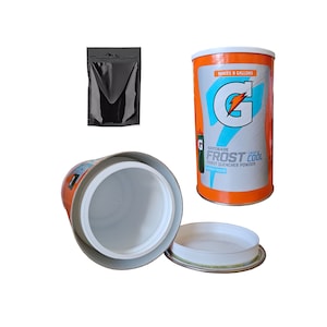 May include: Orange and blue Gatorade Frost Cool Thirst Quencher Powder, makes 9 gallons, black freezer pack, and a white plastic container with a lid.