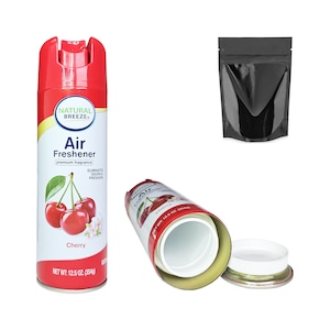 Puede incluir: Una lata roja y blanca de ambientador con un dise&ntilde;o de cereza. La lata est&aacute; etiquetada como "Natural Breeze Air Freshener" y "Cherry". La lata tiene 354 ml. La lata est&aacute; abierta y el interior es visible. La lata es un contenedor secreto.