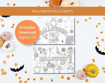 May include: Two Halloween-themed placemats with black and white illustrations of pumpkins, bats, and other spooky elements. The placemats are designed for coloring and include the word "Halloween". The image also includes pumpkins and candy corn.