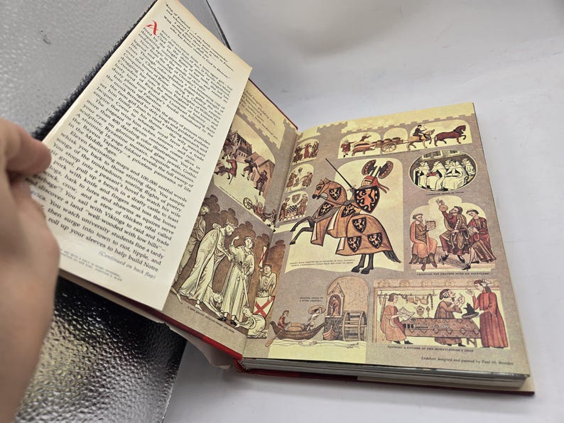 May include: Open book with illustrations of medieval scenes. The right page features a knight on horseback, surrounded by other images of people and events. The left page has text with a large red initial.