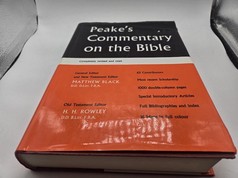 May include: A red and black book titled "Peake's Commentary on the Bible". The book is completely revised and reset. It features 62 contributors, most recent scholarship, 1000 double-column pages, special introductory articles, full bibliographies and index, and 16 maps in full color.