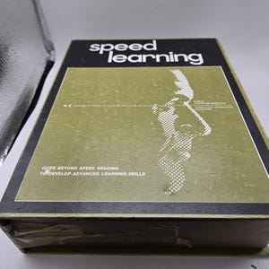 May include: A vintage "Speed Learning" book in a box. The cover is black with the title in white. A green panel features a dotted illustration of a face and text. The box reads "Goes Beyond Speed Reading to Develop Advanced Learning Skills."
