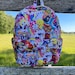 see more listings in the Mini Backpacks section
