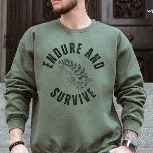 Endure And Survive | The Last Of Us Sweatshirt | TLOU |  Ellie Tattoo | Ellie And Joel Shirts | The Last Of Us Shirt | Video Game Shirt