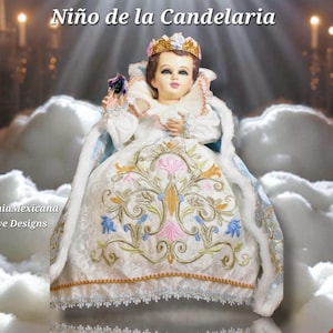 May include: A detailed image of a doll dressed in a white gown with floral embroidery. The doll wears a gold crown and holds a small object. The text "Niño de la Candelaria" is at the top. The doll is set against a backdrop of clouds.