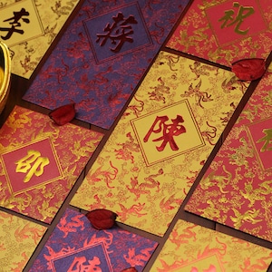Geschenkbox mit 50 Stück Hong Kong High-End-Nachname Roter Umschlag Benutzerdefinierte personalisierte Drache und Phoenix Serie Chinesisches Neujahr Pferd Für 2026 龍鳯呈zu