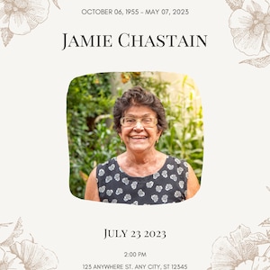 May include: A memorial card with a black and white floral design. The card features a photo of a woman with a warm smile, wearing glasses and a floral patterned dress. The text reads "In loving memory of Jamie Chastain, October 06, 1955 - May 07, 2023, July 23, 2023, 2:00 PM, 123 Anywhere St. Any City, ST 12345."