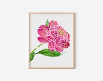 May include: A pink peony flower with green leaves, painted in a watercolor style with gold accents. The artwork is framed in a light wood frame.
