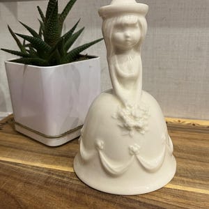 Vintage Golden Crown Girl Bell – E&R Ceramic Figurine, White Glazed Porcelain Bell