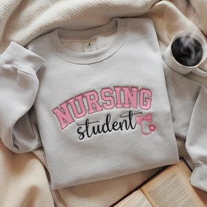 NURSING STUDENT Embroidered Sweatshirt, bow stethoscope, Nursing Sweatshirt, Embroidered Sweatshirt, Nursing School Gift Shirt