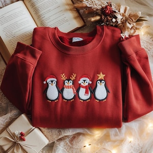 Embroidered Christmas Penguin Sweatshirt, Reindeer Penguin Hoodie, Festive Animal Crewneck, Penguin Lover Gift, Holiday Bird Tee