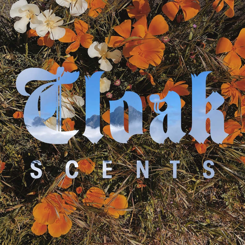 May include: A close-up of a floral arrangement with orange and yellow flowers. The word "Cloak" is superimposed over the flowers in a white, stylized font. The text "Scents" is below the word "Cloak" in a smaller, white font.