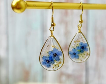 Pendientes de flor de nomeolvides: colgantes de resina con flores prensadas, chapados en oro de 18 quilates.