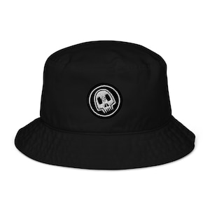 May include: Black bucket hat with a white embroidered skull design in a circle.