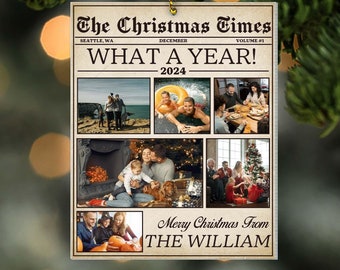 May include: A Christmas ornament featuring a newspaper design with the headline "The Christmas Times" and the text "What a Year! 2024". The ornament includes six photos of a family, and the text "Merry Christmas From THE WILLIAM".