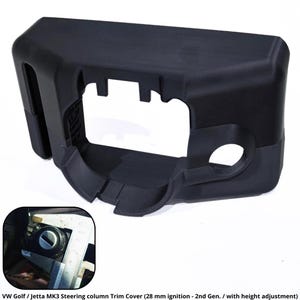 Può includere: Una copertura di finitura del piantone dello sterzo nera per VW Golf o Jetta MK3. La copertura ha una forma rettangolare con ritagli e un'apertura circolare. Il testo in basso recita: VW Golf / Jetta MK3 Steering column Trim Cover (28 mm ignition - 2nd Gen. / with height adjustment).