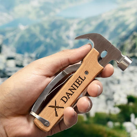A laser-engraved custom multitool with a hunting/outdoors theme — the personalization plus practical utility combo makes it a genuinely great Dad gift.