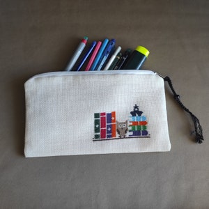 Books and owl pen holder, The pattern is cross-stitch