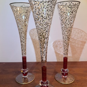 May include: A white ceramic mug with a black handle and the text "But First, Coffee" in a handwritten style. The mug is likely 11-15 ounces, perfect for a morning beverage.