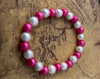 pink and white bead bracelet