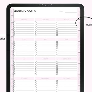 May include: A digital planner with a monthly goal tracker. The planner has tabs for different categories, such as fitness, nutrition, and wellness. Each tab has a list of goals for each month of the year. The planner is designed to help users stay organized and on track with their goals.