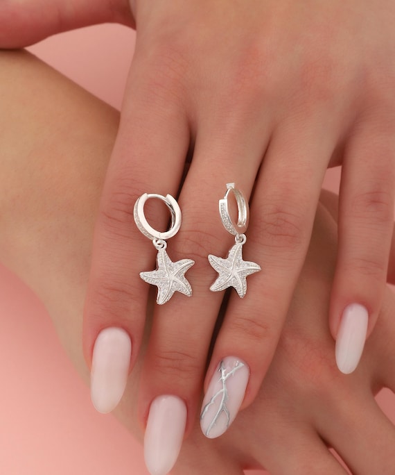 Orecchini Stella Marina Argento 925 placcato oro bianco con pavé di zirconi azzurri e perla pendente
