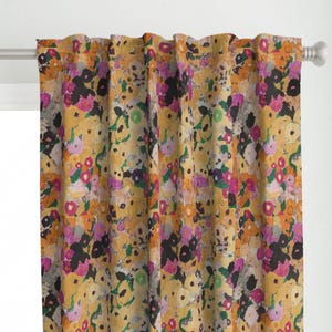 May include: A pair of yellow curtains with a floral pattern featuring pink, purple, black, and green flowers. The fabric has a textured, painterly look.