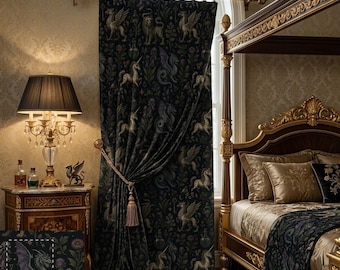 May include: Dark, patterned curtain featuring mythical creatures like unicorns and griffins. The curtain is dark with gold accents, and is paired with a luxurious bed with gold trim and pillows. A lamp with a black shade sits on a side table.