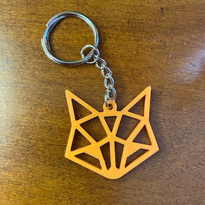 Geometrischer Fuchs-Schlüsselanhänger – Orange