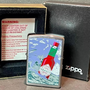 Vintage 1997 ZIPPO Lighter, TABBASCO Brand Pepper Sauce Bottle in Wave, Unused