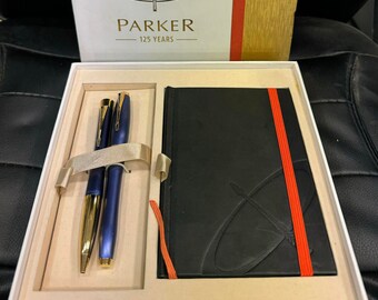 Stylo à bille haut de gamme PARKER 125 ans d'existence, bleu perle x2 et carnet de notes