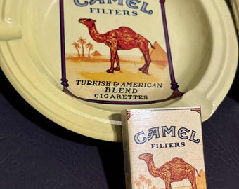 camel cigarette ashtrays Vintage Cigarette, Lot of Tin Ashtray, EMPTY Packet of Cigarettes and Safety Matches Vintage 70s Yellow Plastic Camel