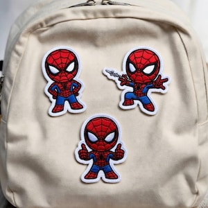 May include: A handmade wooden sign with the text "Welcome to our home" in a handwritten style. The sign is painted white with black lettering and a distressed finish, suitable for indoor or outdoor use.