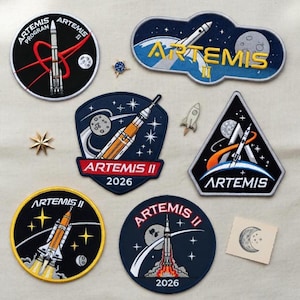 May include: A set of three ceramic mugs with a speckled, matte finish. The mugs are in shades of cream, light gray, and dark gray. Each mug has a simple, minimalist design, perfect for coffee or tea.