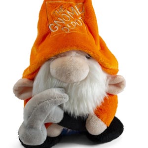 May include: Orange plush gnome wearing a hat with the text "The Gnome Depot" embroidered on it. The gnome is holding a grey hammer.