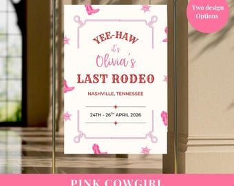 May include: A white rectangular welcome sign featuring a pink rope border, pink cowboy boots, and star icons. The text reads: YEE-HAW it's Olivia's LAST RODEO, NASHVILLE, TENNESSEE, 24TH - 26TH APRIL 2026. The sign is displayed on a gold metal stand.