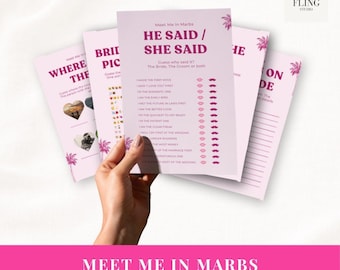 May include: A set of light pink printed game cards for a wedding event. The central card features the text HE SAID / SHE SAID, a list of questions, and icons of lips and mustaches. Other visible cards include WHERE, BRIDE PICKS, and ON SIDE.