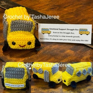 May include: A handmade yellow crochet school bus with gray roof and black wheels. The bus has a smiling face and the text "Emotional Support Struggle Bus" on a small card. The text "Crochet by TashaJeree" is also visible.