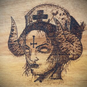 Teak meets devil - evil nurse - pyrography