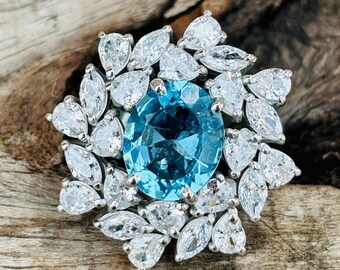 Paraiba Blue Ring | Oval 9x7mm, Zircon Halo, Sterling Silver
