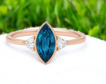 Marquise Lab London Blue Topaz Ring: Rose Gold Plated, CZ Accents